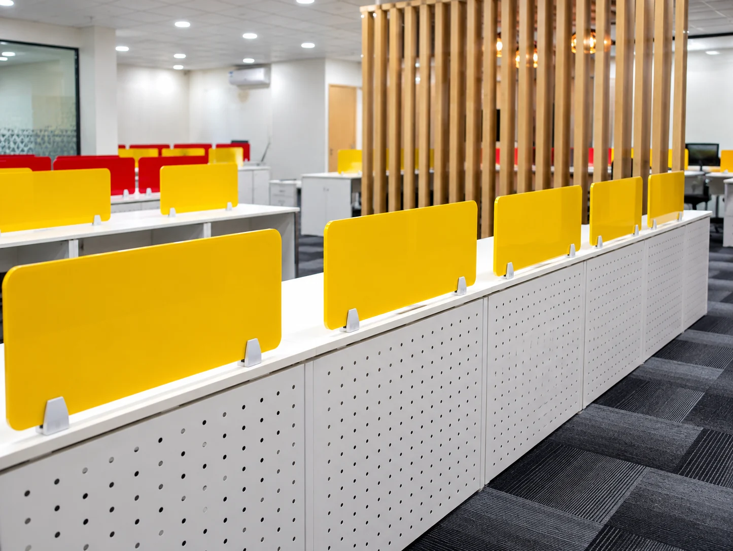 Merlla staff cleaning a bright corporate office workspace